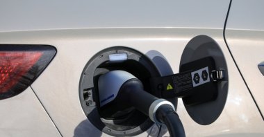 An electric vehicle is seen charging, Ankara, Türkiye, April 16, 2026. (Shutterstock Photo)