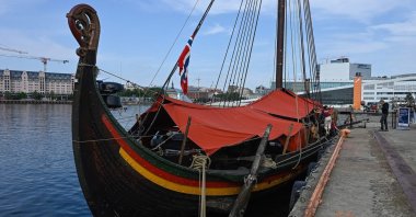 The Draken Harald Harfagre (the ship used in the movie the Odyssey) is docked outside Oslo Opera, Oslo, Norway, Aug. 14, 2026. (AFP Photo)