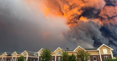Smoke billows from the burning Wildberries warehouses following a Ukrainian drone attack in Koledino, Moscow region, Russia, Aug. 16, 2026. (Reuters Photo)