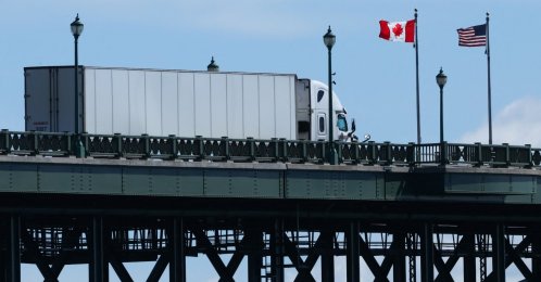A truck passes over the Peace Bridge from Buffalo, New York, into Canada, in Fort Erie, Canada, Aug. 18, 2026. (AFP Photo)