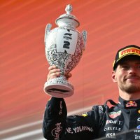 Second-placed Red Bull Racing's Dutch driver Max Verstappen celebrates with the trophy on the podium after the Formula One Hungarian Grand Prix at the Hungaroring racetrack, Mogyorod, Hungary, July 26, 2026. (AFP Photo)