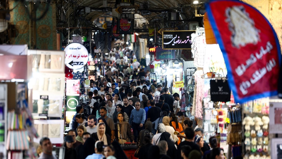 People walk in the Grand Bazaar in Tehran, Iran, Aug. 17, 2026. (Reuters Photo)