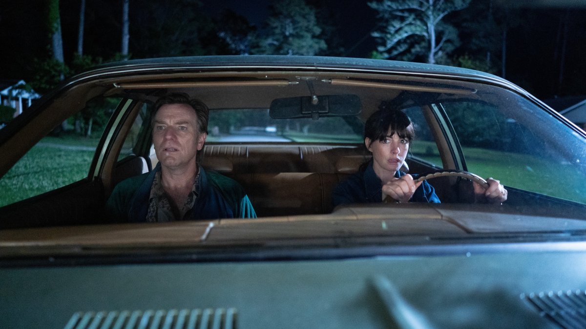 This image released by Warner Bros. Pictures shows Ewan McGregor (L) and Anne Hathaway in a scene from "The End of Oak Street." (AP Photo)