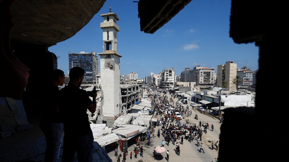 Palestinians attend the funeral of 50 people from three families killed by Israel, whose bodies were retrieved from under the rubble recently, Gaza City, Palestine, Aug. 20, 2026. (Reuters Photo)