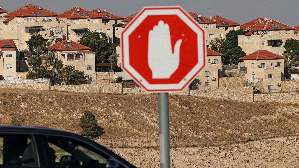 A car drives past the Israeli settlement of Maale Adumim in the Israeli-occupied West Bank, Palestine, July 24, 2026. (AFP Photo)