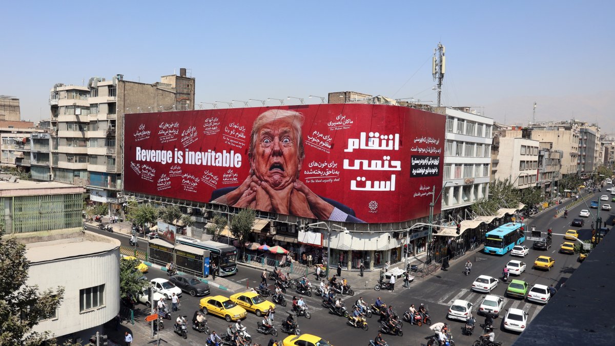 Iranians drive near an anti-Trump billboard in Tehran, Iran, Aug. 19, 2026. (EPA Photo)