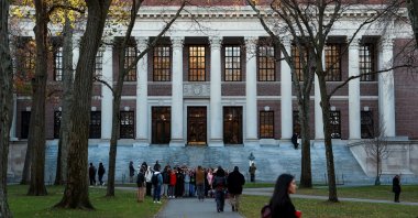 FILE PHOTO: Students walk past Widener Library at Harvard University in Cambridge, Massachusetts, U.S., Nov. 19, 2025. (Reuters Photo)
