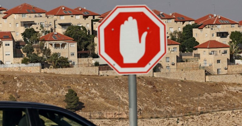 A car drives past the Israeli settlement of Maale Adumim in the Israeli-occupied West Bank, Palestine, July 24, 2026. (AFP Photo)