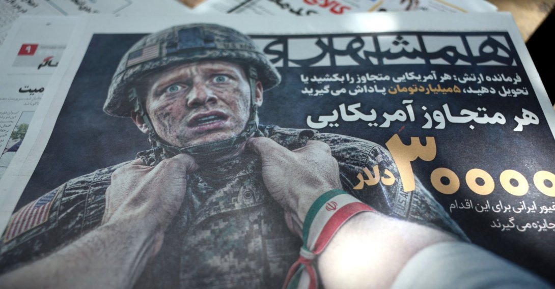A copy of the Iranian daily newspaper Hamshahri depicting a U.S. soldier is displayed outside a kiosk in Tehran, Iran, Aug. 17, 2026. (EPA Photo)