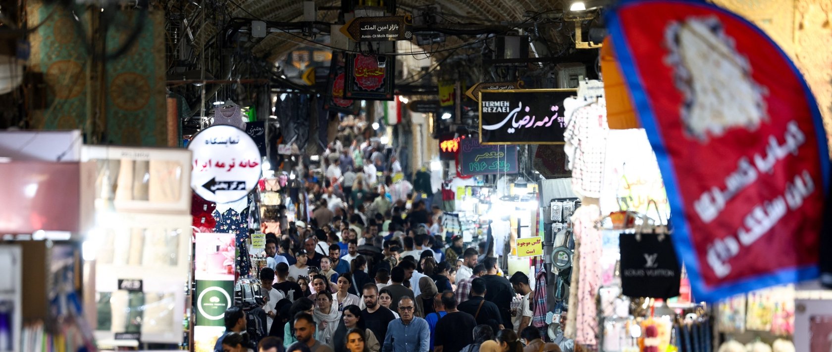People walk in the Grand Bazaar in Tehran, Iran, Aug. 17, 2026. (Reuters Photo)