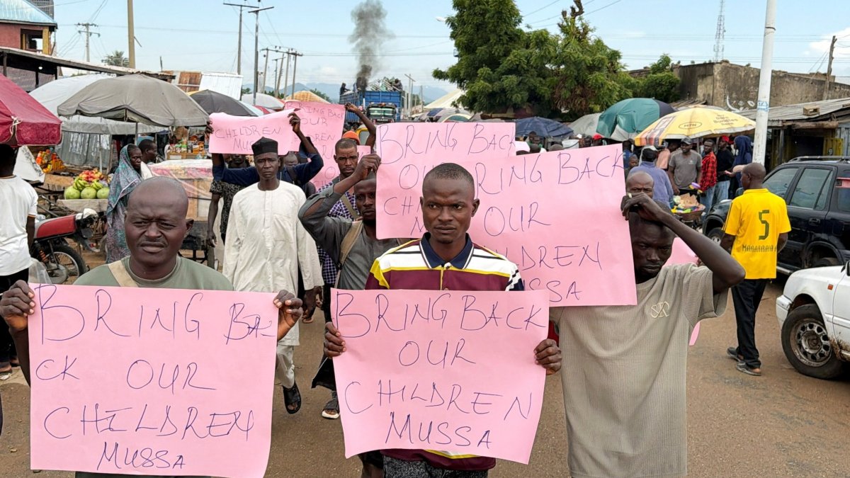 Parents of abducted students hold placards during a protest calling for the release of their children, as students remain in the custody of their captors in Askira-Uba, Nigeria, Aug. 20, 2026. (Reuters Photo)