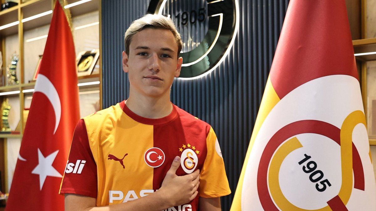 Galatasaray's new signing Aleksey Batrakov poses for a photo after his unveiling, Istanbul, Türkiye, Aug. 20, 2026. (IHA Photo)