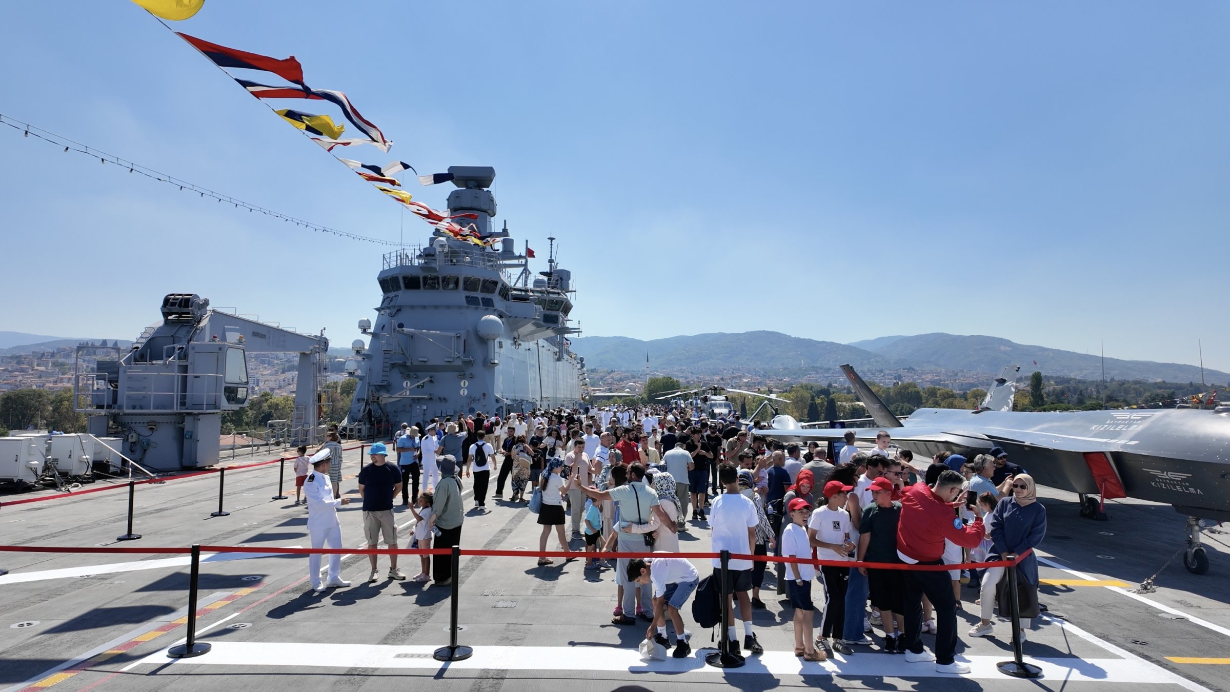 People tour the TCG Anadolu aircraft carrier during the Teknofest Blue Homeland in Kocaeli province, northwestern Türkiye, Aug. 21, 2026. (Photo by Buğra Çakmak)