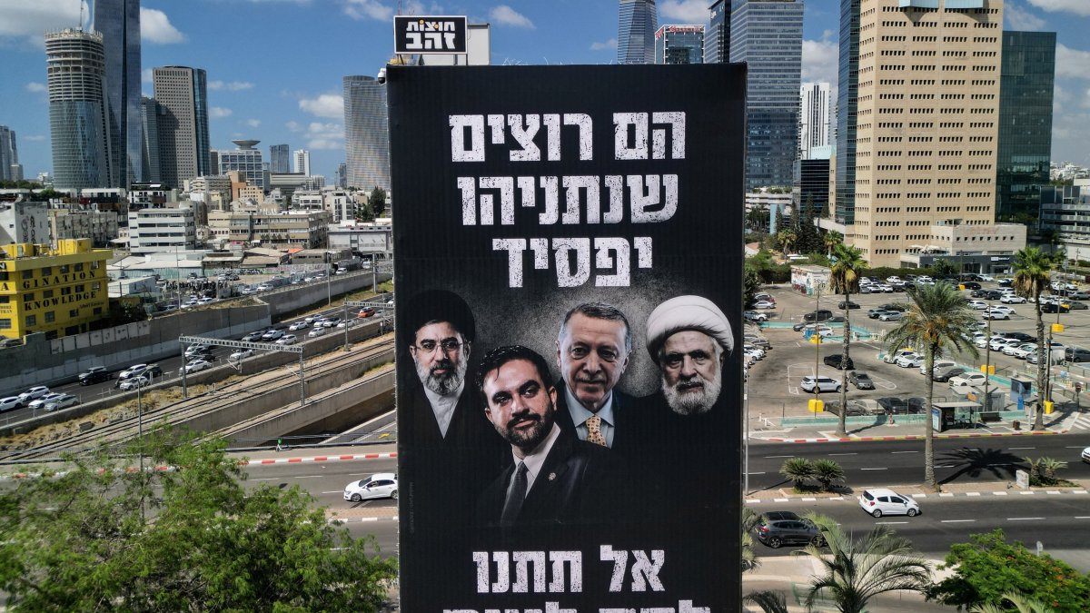 A drone view of an election billboard by Benjamin Netanyahu's Likud Party depicting Iran's Supreme Leader Mojtaba Khamenei, NYC Mayor Zohran Mamdani, President Tayyip Erdoğan and Hezbollah chief Naim Qassem and a text in Hebrew that reads "They Want Netanyahu to Lose, Don't let them Win", in Tel Aviv, Israel Aug. 17, 2026. (AFP File Photo)