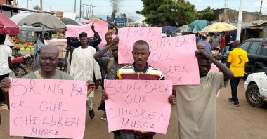 Parents of abducted students hold placards during a protest calling for the release of their children, as students remain in the custody of their captors in Askira-Uba, Nigeria, Aug. 20, 2026. (Reuters Photo)
