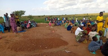 Mourners gather near the graves of victims who died in a boat accident, most of them children, Gorau, Sokoto State, Nigeria, Aug. 20, 2026. (Reuters Photo)