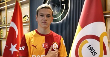 Galatasaray's new signing Aleksey Batrakov poses for a photo after his unveiling, Istanbul, Türkiye, Aug. 20, 2026. (IHA Photo)
