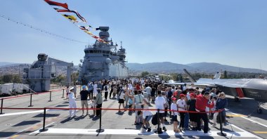 People tour the TCG Anadolu aircraft carrier during the Teknofest Blue Homeland in Kocaeli province, northwestern Türkiye, Aug. 21, 2026. (Photo by Buğra Çakmak)