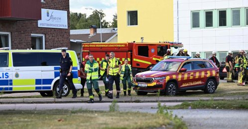Police officers and rescue services work at the scene where an attacker with a sword wounded several people at a high school in Fagersta, central Sweden, Aug. 21, 2026. (AFP Photo)