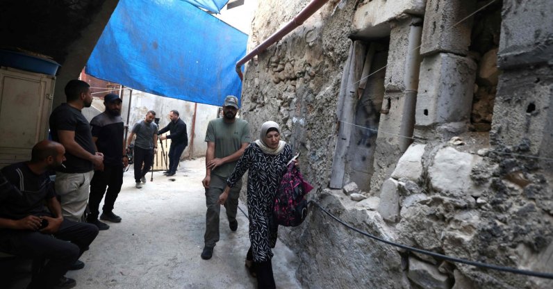 Suad, the wife of 58-year-old Fathi Zidan Hazem, who was killed by the Israeli military as they tried to arrest him, walks outside her home in the northern city of Jenin, West Bank, Palestine, Aug. 21, 2026. (AFP Photo)