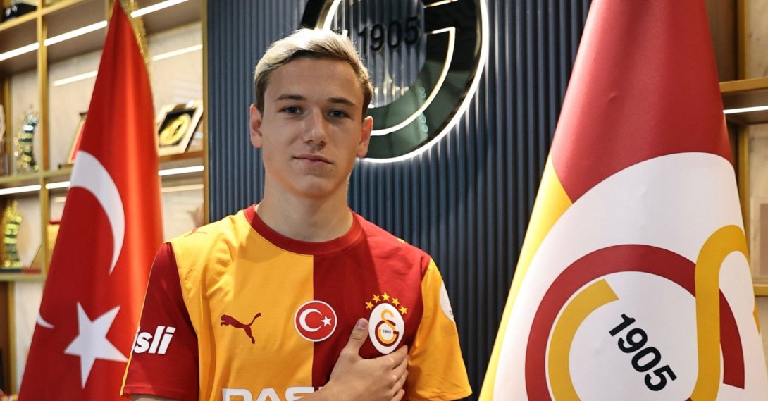 Galatasaray's new signing Aleksey Batrakov poses for a photo after his unveiling, Istanbul, Türkiye, Aug. 20, 2026. (IHA Photo)