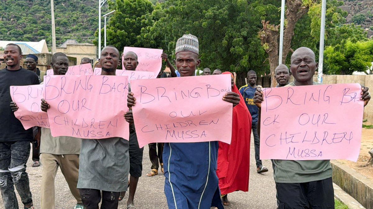 Parents of abducted students hold placards during a protest calling for the release of their children, as students remain in the custody of their captors in Askira-Uba, Borno State, Nigeria, Aug. 20, 2026. (Reuters Photo)