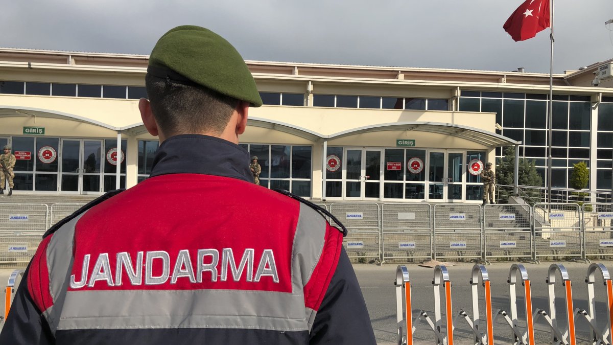 A gendarmerie officer stands outside the prison-courthouse complex where the trial's next hearing will be held, Istanbul, Türkiye, April 30, 2018. (AP Photo)