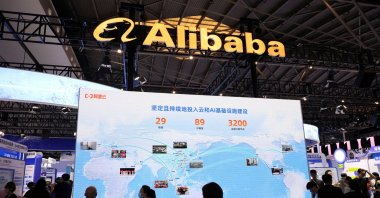 People visit an Alibaba booth during the World Artificial Intelligence Conference, Shanghai, China, July 26, 2025. (Reuters Photo)