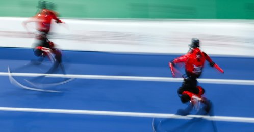 Humanoid robots run during an event at the 2026 World Humanoid Robot Games in the National Speed Skating Oval, Beijing, China, Aug. 22, 2026. (EPA Photo)
