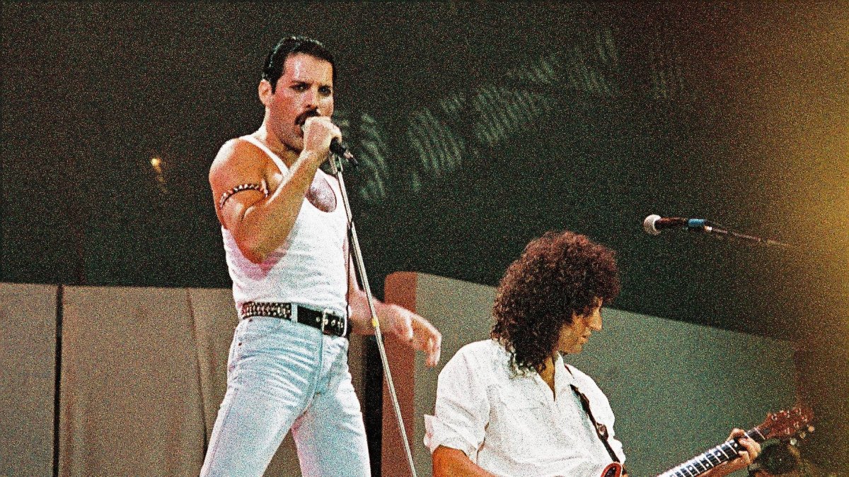 Freddie Mercury of Queen performs on stage at Live Aid at Wembley Stadium, London, U.K., July 13, 1985. (Getty Images Photo)