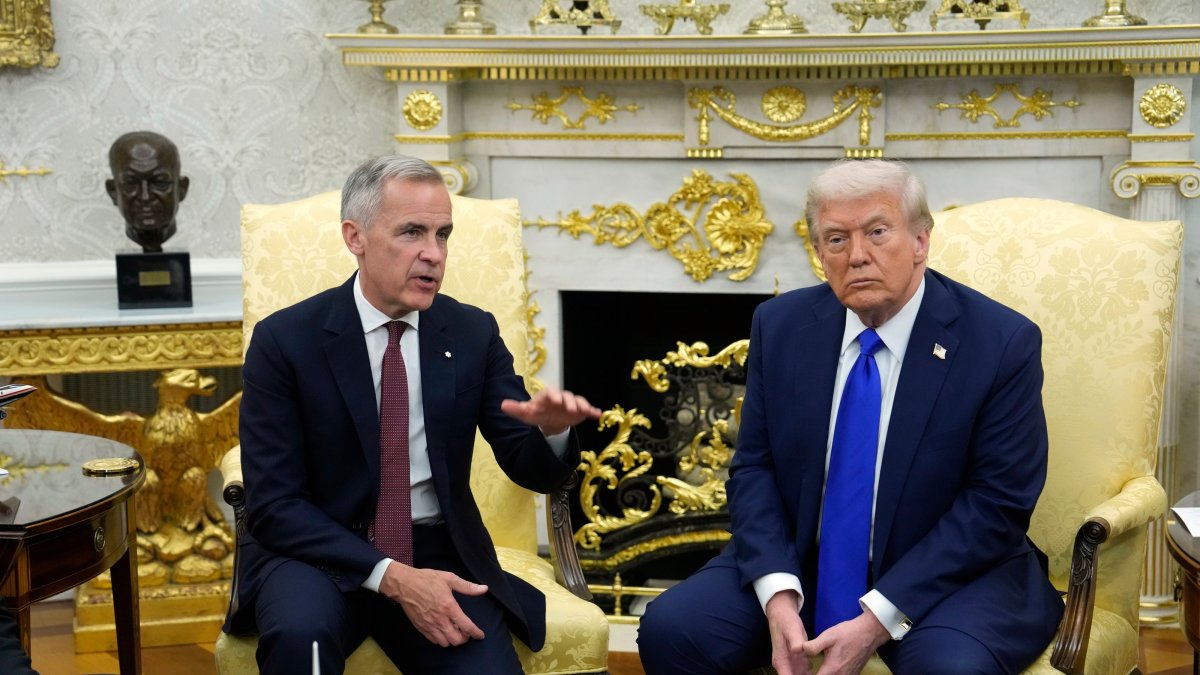 Canadian Prime Minister Mark Carney and U.S. President Donald Trump hold a press conference at the White House in Washington, U.S., Oct. 7, 2025. (AP Photo)
