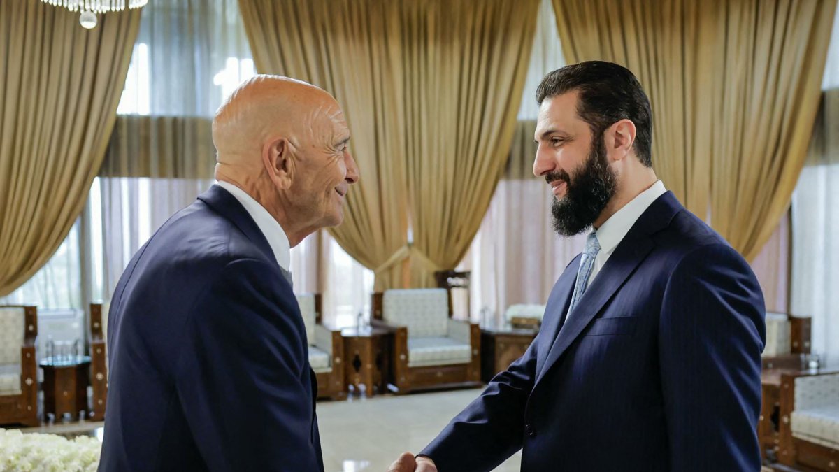 This handout picture released by the Syrian Presidency's Telegram page, shows Syria's President Ahmed al-Sharaa (R) shaking hands with U.S. envoy Tom Barrack at the Presidential Palace in Damascus, Syria, Jan. 18, 2026. (AFP Photo)