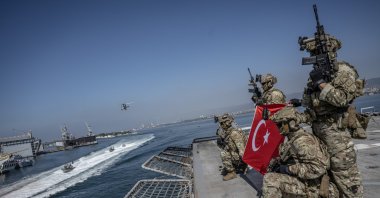 Underwater Offense (SAT) and Underwater Defense (SAS) commandos of the Turkish Naval Forces perform a demonstration during Teknofest Blue Homeland, Kocaeli, Türkiye, Aug. 23, 2026. (AA Photo)
