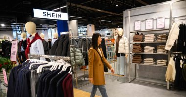 A customer visits the new Shein fast-fashion retail at its opening day in the BHV department store, Angers, western France, Feb. 25, 2026. (AFP Photo)
