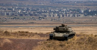 An Israeli tank stands in position near the cease-fire line in the Israeli-occupied Golan Heights, Syria, Aug. 20, 2026. (Reuters Photo)