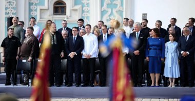 (From Top L) Ukraine Defense Minister Denys Shmyhal, Britain's Prime Minister Andy Burnham (4th L), Finland's President Alexander Stubb (C), Lithuania's President Gitanas Nauseda (4th R), Ukraine's Defense Minister Rustem Umerov (4th R Rear) and Estonia's President Alar Karis (R) attend a commemorative ceremony on Ukraine's 35th Independence Day outside St. Sofia cathedral in Kyiv, Ukraine, Aug. 24, 2026. (AFP Photo)