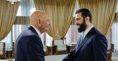 This handout picture released by the Syrian Presidency&amp;#039;s Telegram page, shows Syria&amp;#039;s President Ahmed al-Sharaa (R) shaking hands with U.S. envoy Tom Barrack at the Presidential Palace in Damascus, Syria, Jan. 18, 2026. (AFP Photo)
