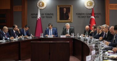 Trade Minister Ömer Bolat (C-R) and Qatar’s Minister of State for Foreign Trade, Ahmed bin Mohammed Al-Sayed (C-L), during a roundtable meeting in Ankara, Türkiye, Aug. 24, 2026. (AA Photo)