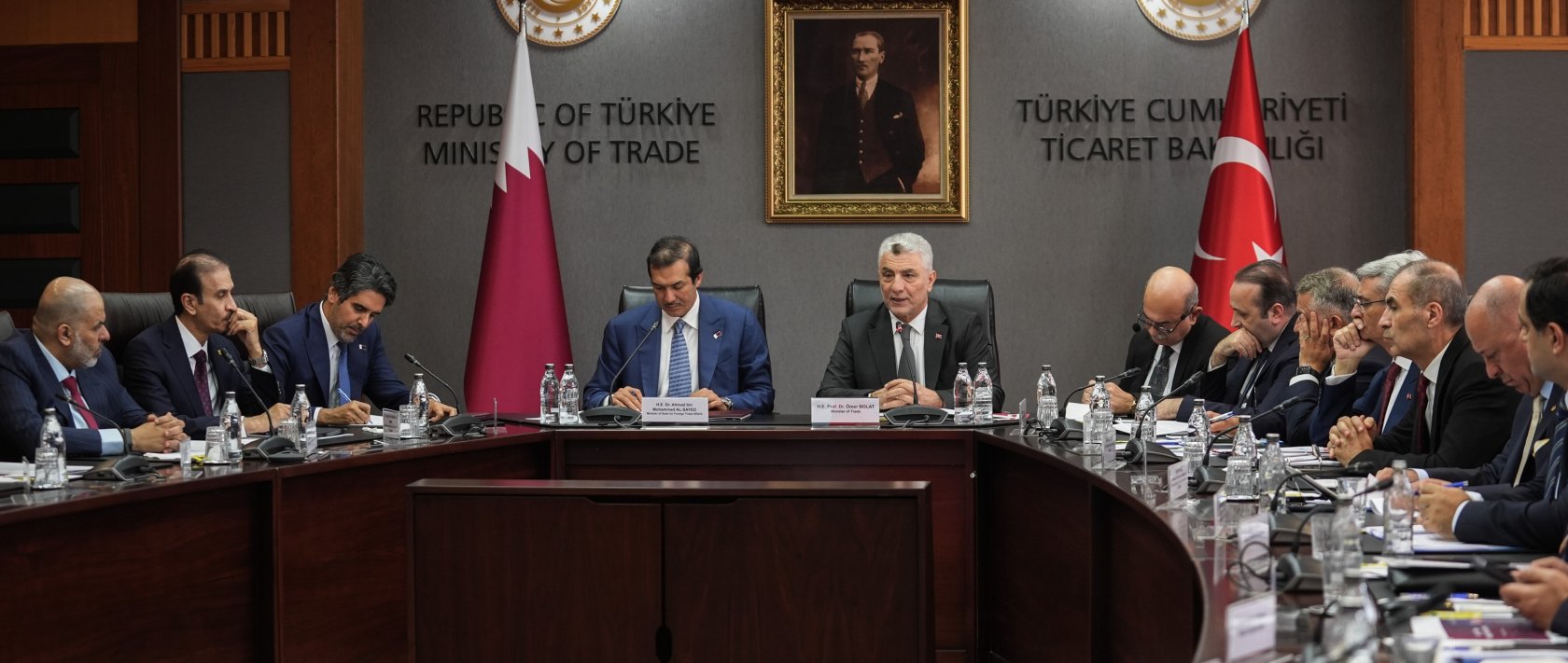 Trade Minister Ömer Bolat (C-R) and Qatar’s Minister of State for Foreign Trade, Ahmed bin Mohammed Al-Sayed (C-L), during a roundtable meeting in Ankara, Türkiye, Aug. 24, 2026. (AA Photo)