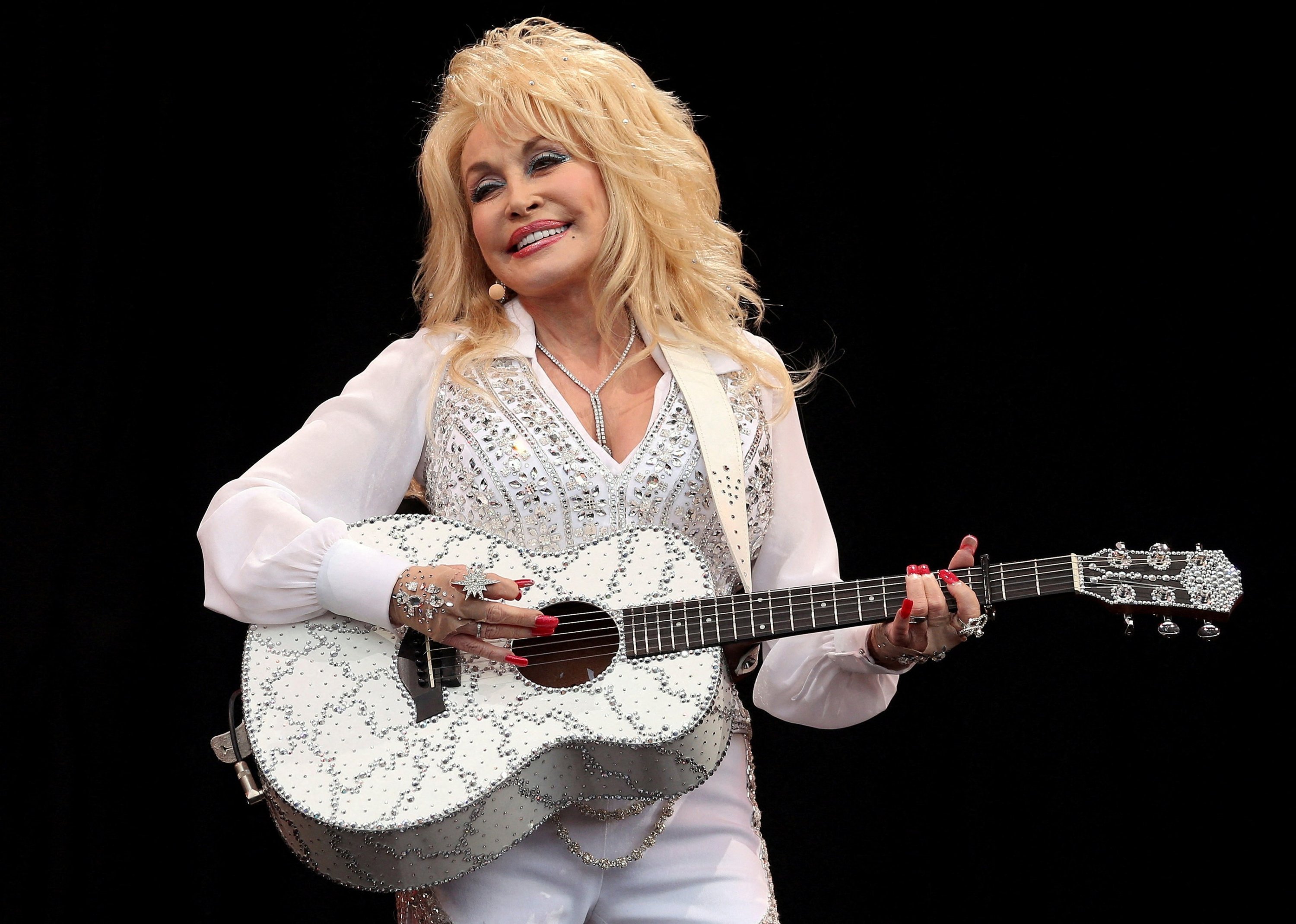 Country music icon Dolly Parton dies at 80