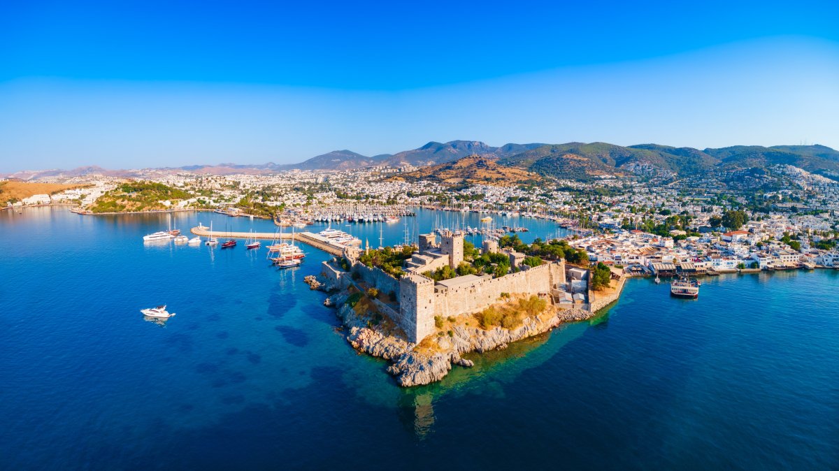 The Bodrum Castle of St. Peter and marina aerial panoramic view of the city, Bodrum, Türkiye.