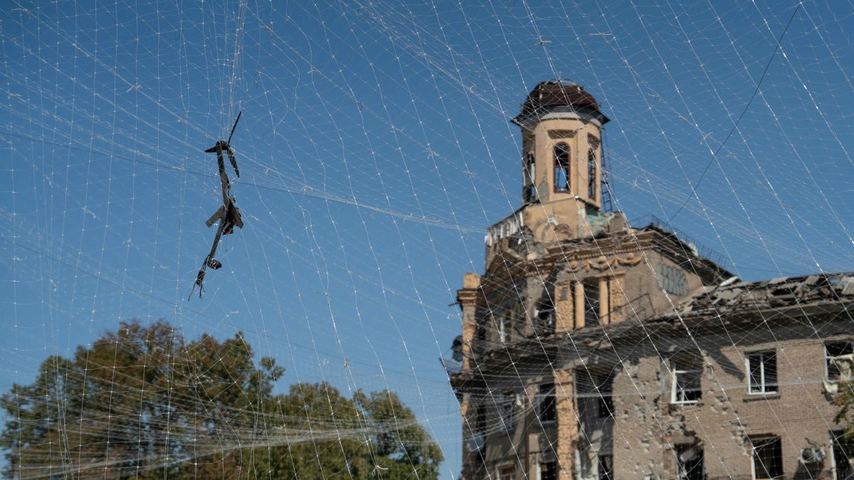 A destroyed drone is seen caught in an anti-drone net in Druzhkivka, Donetsk region, Ukraine, Aug. 22, 2026. (AFP Photo)