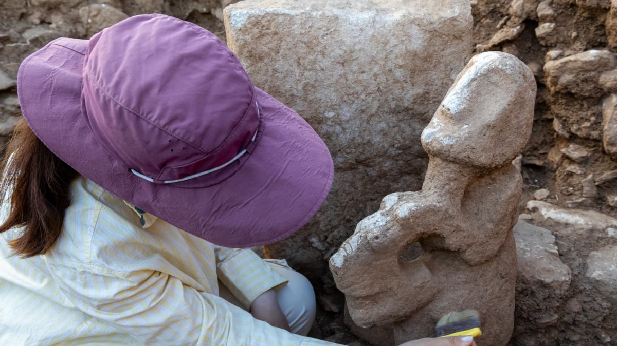 A composite sculpture depicting a human figure seated on the back of a leopard, dating back about 11,000 years, was unearthed during ongoing excavations at Karahantepe, Şanlıurfa, Türkiye, Aug. 25, 2026. (DHA Photo)