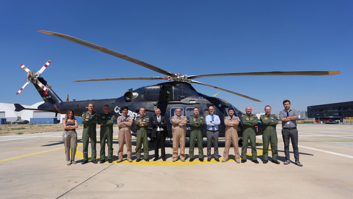 The crew is photographed in front of T-625 Gökbey helicopter, Ankara, Türkiye, Aug. 25, 2026. (DHA Photo)
