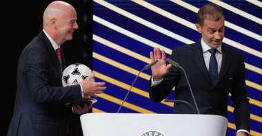 FIFA President Gianni Infantino (L) speaks with UEFA President Aleksander Ceferin after addressing the 50th UEFA Ordinary Congress, Brussels, Belgium, Feb. 12, 2026. (AFP Photo)