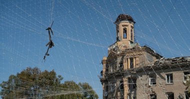 A destroyed drone is seen caught in an anti-drone net in Druzhkivka, Donetsk region, Ukraine, Aug. 22, 2026. (AFP Photo)