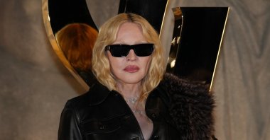 Madonna poses before the Saint Laurent Spring/Summer 2026 collection, Paris, France, Sept. 29, 2025. (AP Photo)