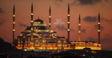 A mahya bearing the words “May Our Mawlid Night Be Blessed” hangs between the minarets of the Büyük Çamlıca Mosque, Istanbul, Türkiye, Aug. 24, 2026. (AA Photo)