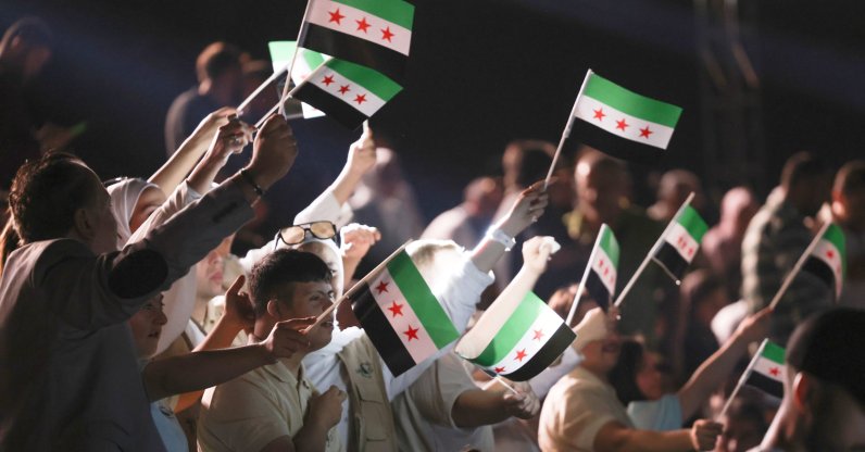 People celebrate the reopening of the historic Aleppo Citadel after restoration works that cover war-damaged sections, Aleppo, Syria, Sept. 27, 2025. (Getty Images Photo)