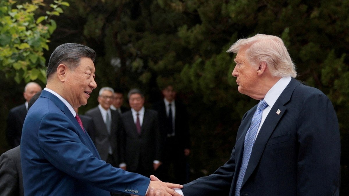 U.S. President Donald Trump shakes hands with Chinese President Xi Jinping as they leave after a visit to the Zhongnanhai Garden, Beijing, China, May 15, 2026. (Reuters Photo)